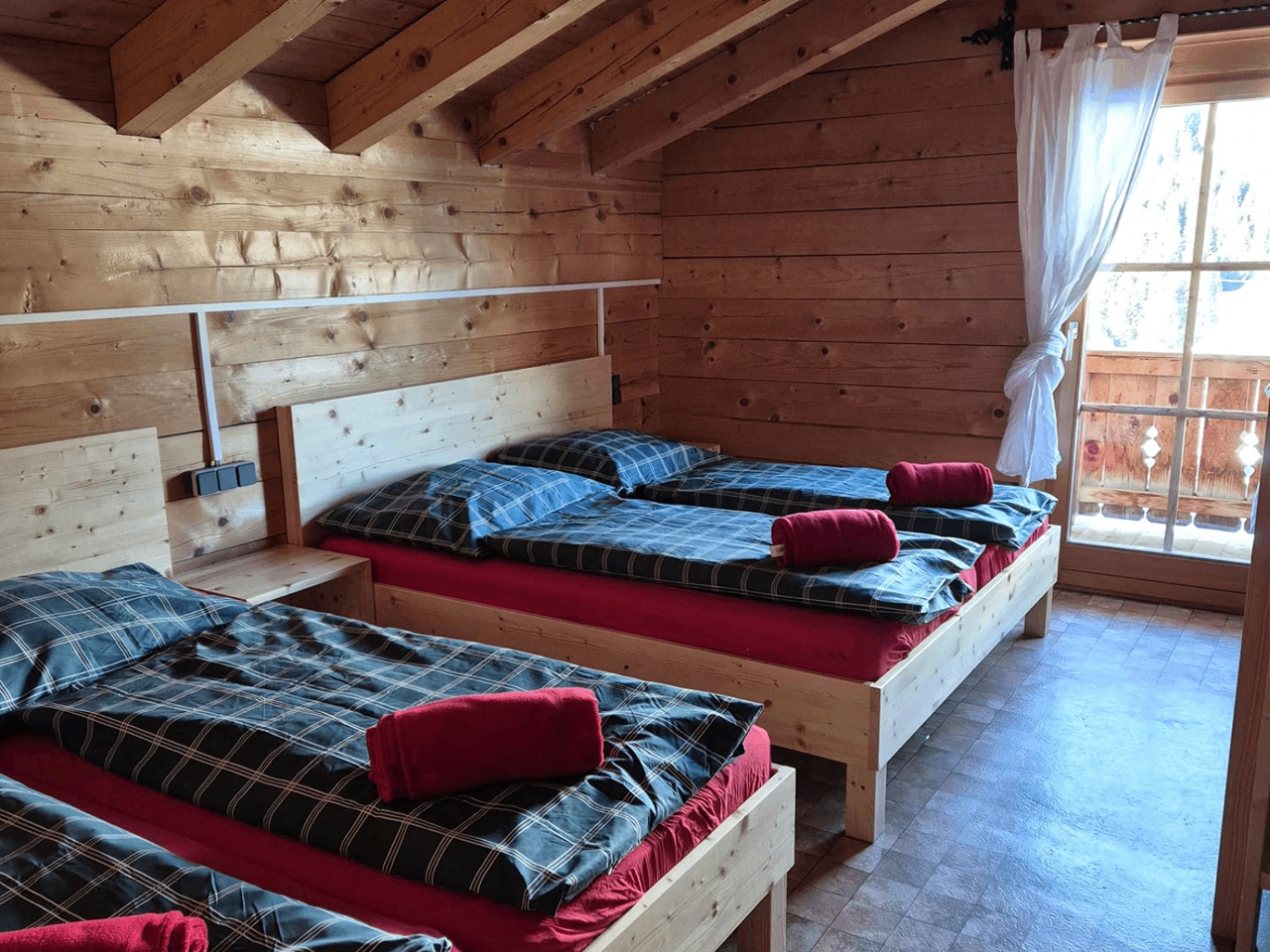 Gemütliches Doppelzimmer der Huberalm Medalalpe